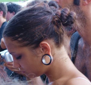 Young_woman_with_stretched_ear_piercing